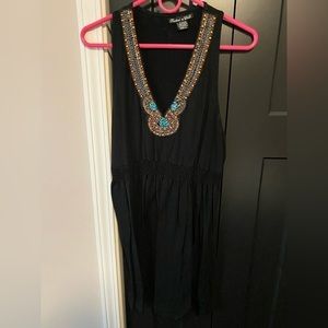 Beaded neckline black dress. Short length. Size X-Large.